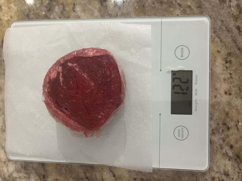A small fillet steak, uncooked weight 122g, far exceeds the recommended lean portion weight of 50-75g