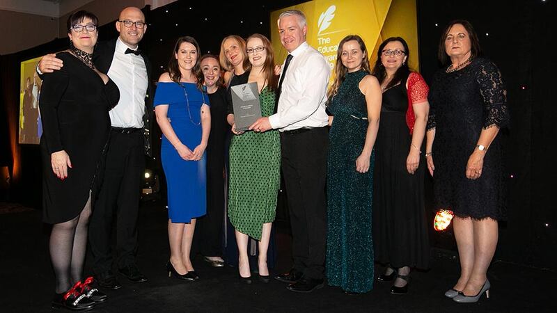 Dr Jane O'Keeffe, JC & Director of Supply Chain, NMCI/CIT presents the Overall Excellence in Education award to the National College of Ireland Team
