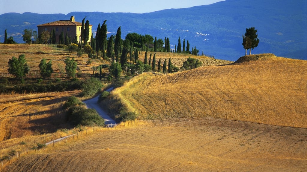Seduction with strings attached: the Tuscany countryside is sometimes vulnerable to earthquakes, subsidence and intricate planning regulations. Photograph: Robert Harding/Getty