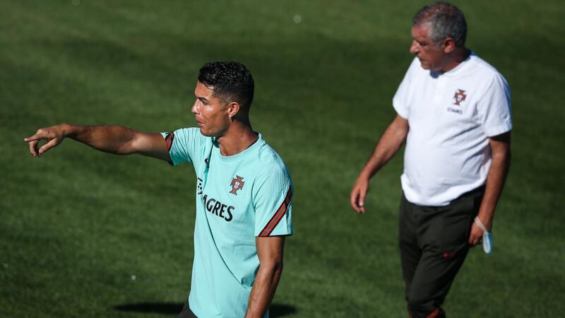 Portugal’s Cristiano Ronaldo and head coach Fernando Santos at the Cidade do Futebol training camp in Oeiras on outskirts of Lisbon ahead of Wednesday’s World Cup qualifier. Photograph: Rodrigo Antunes/EPA