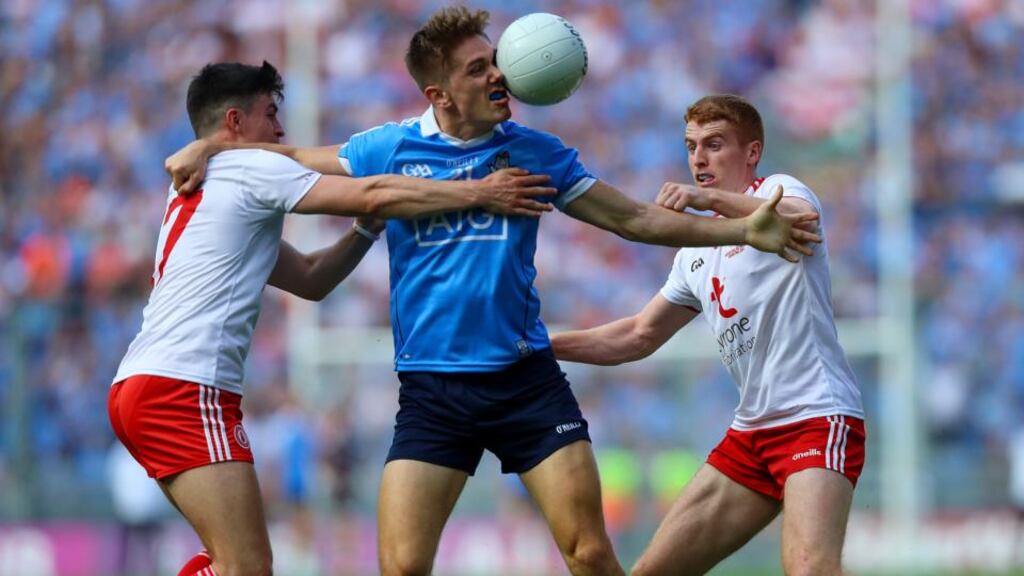 Dublin’s Michael Fitzsimons battles with Tyrone’s Lee Brennan and Peter Harte at Croke Park. Harte, like most of Tyrone’s big names, was kept very quiet. Photograph: Tommy Dickson/Inpho