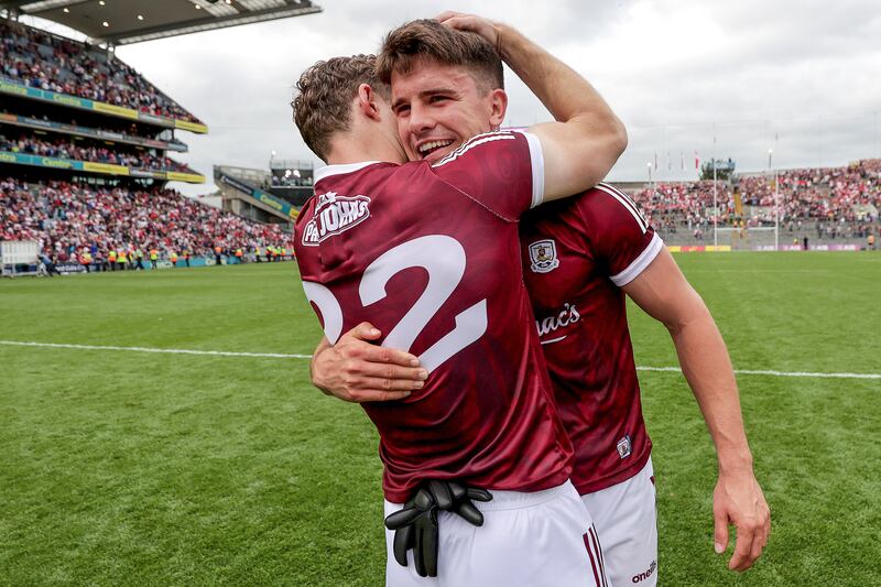Galway's Sean Kelly celebrates after beating Derry with Owen Gallagher. Photograph: Laszlo Geczo/Inpho