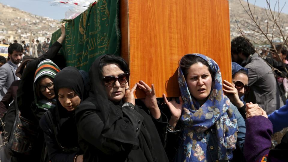 Farkhunda’s coffin is borne by women before her burial. Photograph: Mohammad Ismail/Reuters