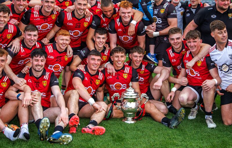 Down’s captain Pierce Laverty and teammates with the Tailteann Cup. Photograph: James Crombie/Inpho