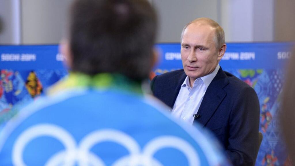 Russia’s president Vladimir Putin meets with volunteers who are taking part in the preparations for the Sochi 2014 Winter Olympic Games. Photograph: Alexei Nikolskyi/Reuters