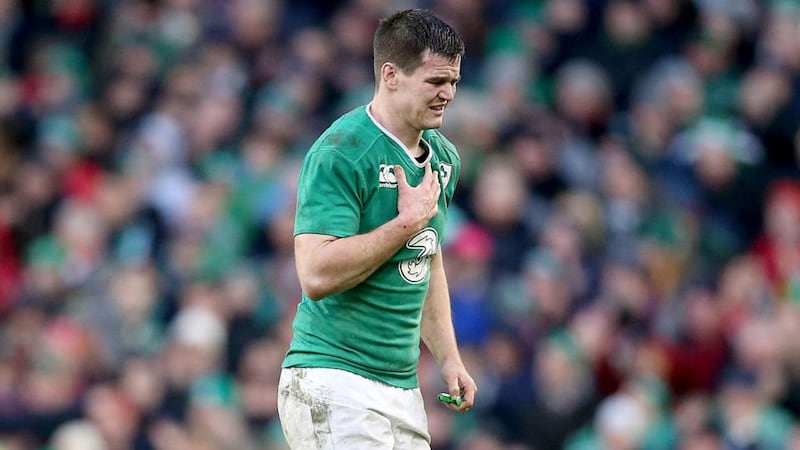 Johnny Sexton leaves the pitch with a chest injury late in the Six Nations game against Wales at the Aviva Stadium. Photograph: Dan Sheridan/Inpho