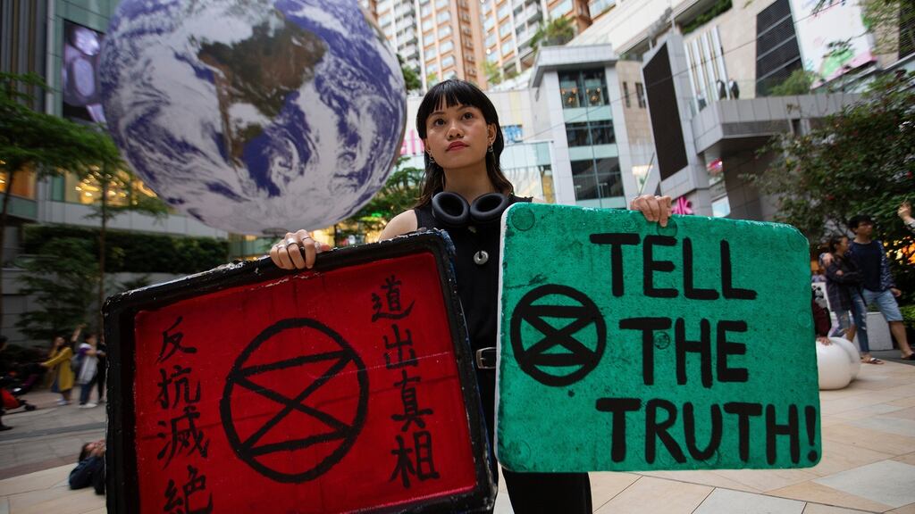 A climate protester in Hong Kong on May 4th. The activists are calling on the Hong Kong government to declare a climate and environmental emergency. Photograph: Alex Hofford/EPA