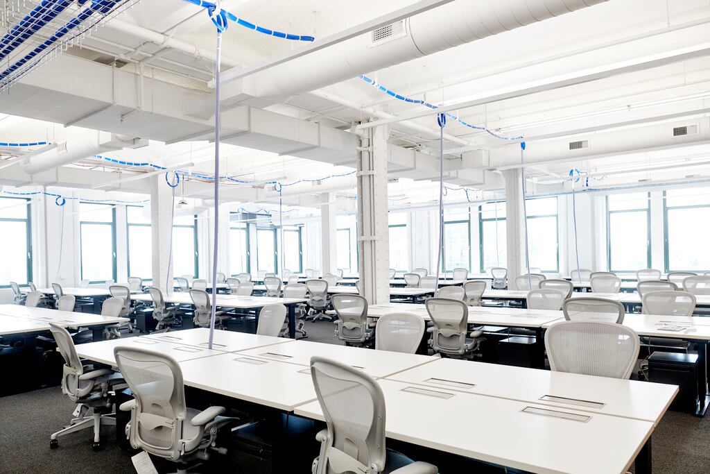 More than a third of office desks are never used, even though workstations in a typical, traditionally designed office take up about 80 per cent of the floor space. Photograph: Gabby Jones/New York Times