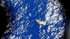 Cluster of orange sea objects not linked to missing Malaysia jet