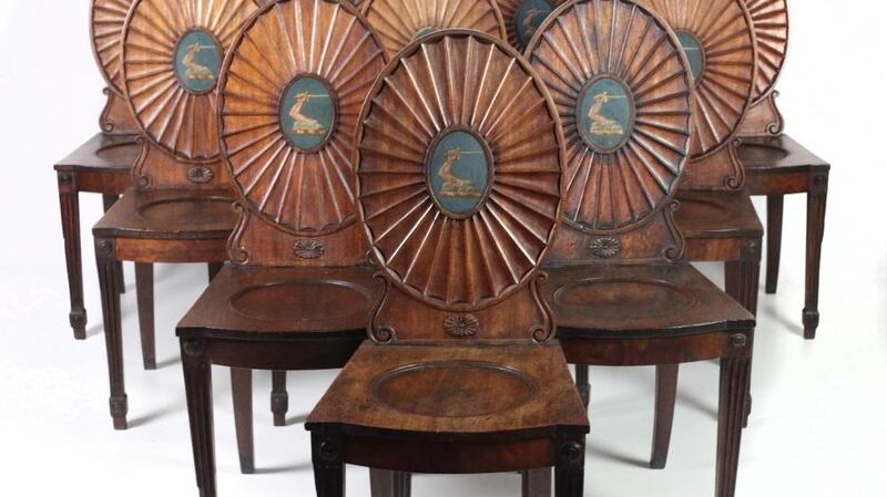 Set of 10 crested hall chairs from Dromoland Castle: made €19,000 at Fonsie Mealy Auctioneers