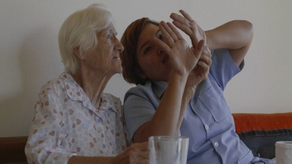 Pomm is a carer in Thailand for white, wealthy westerners with Alzheimer’s.