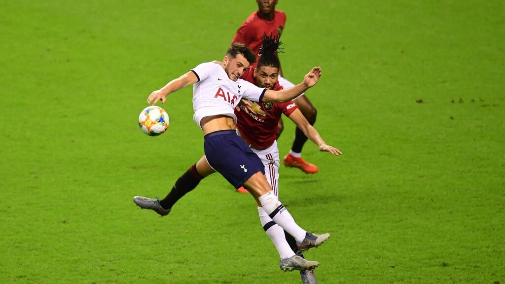 Tottenham Hotspur’s Troy Parrott challenges for the ball with Manchester United’s Chris Smalling during the International Champions Cup match at the Shanghai Hongkou Stadium in Shanghai, China. Photograph: Di Yin/Getty Images