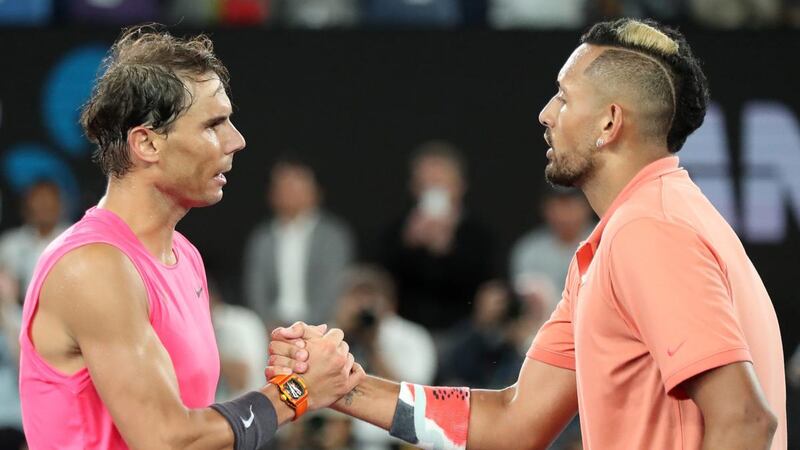 Rafael Nadal and Kick Kyrgios shake hands after their clash in Melbourne. Photograph: Jonathan DiMaggio/Getty