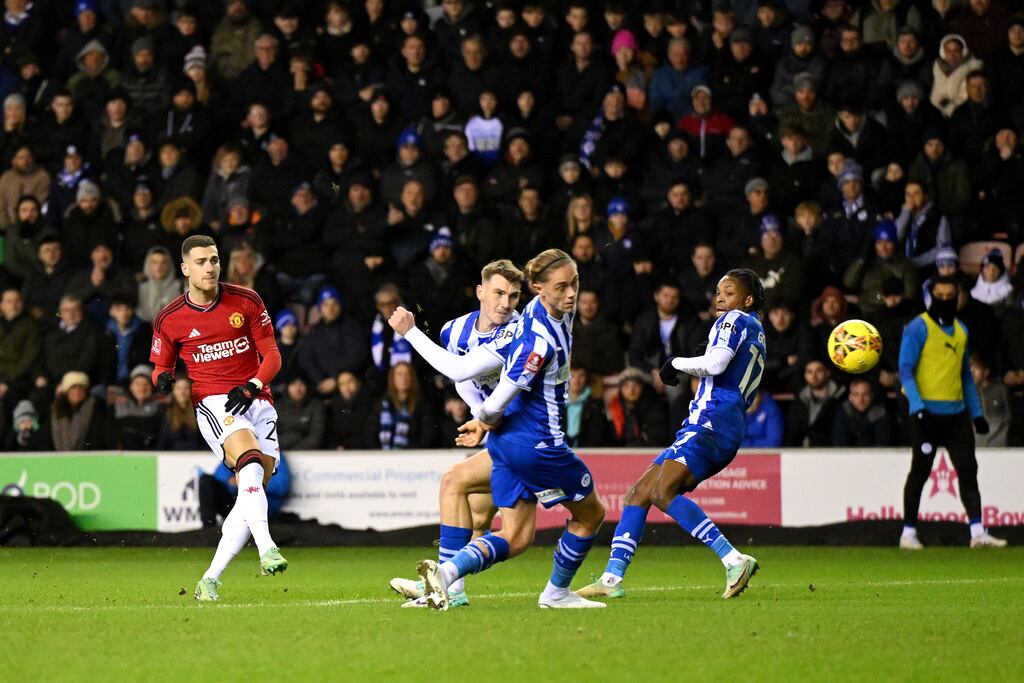 Diogo Dalot of Manchester United scores against Wigan. Photograph: Michael Regan/Getty