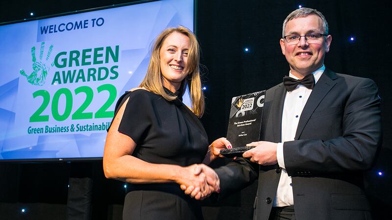 Brendan Connolly, Renewable Energy Development Manager at Bord na Móna, presents The Green Professional Services Award to Susan Meehan, Arthur Cox.