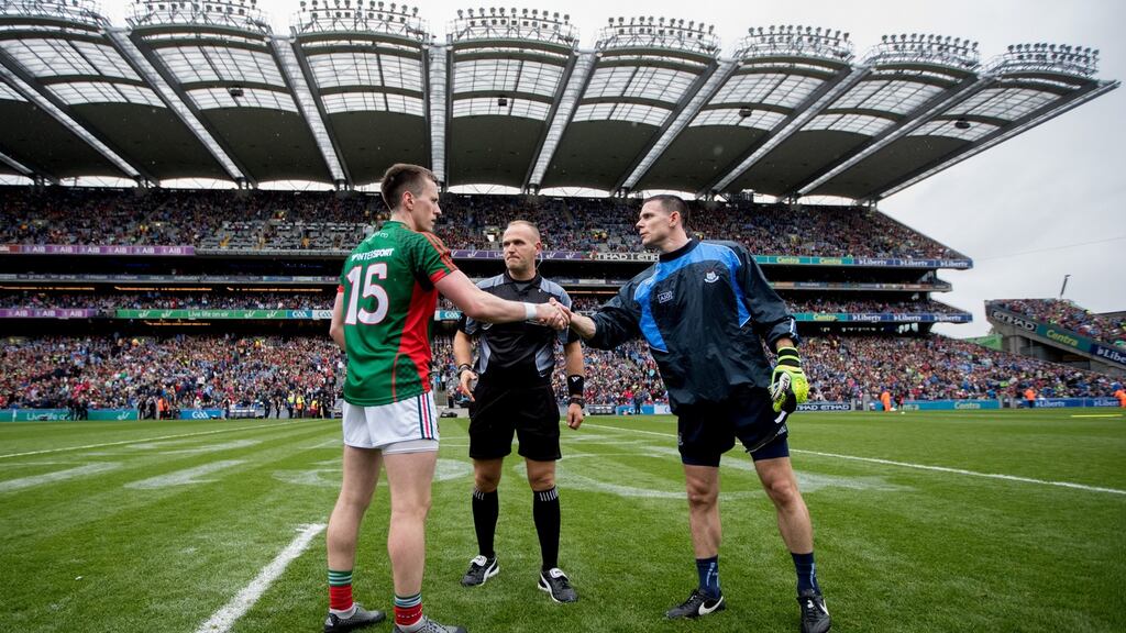 Mayo’s Cillian O’Connor shakes hands with Dublin goalkeeper Stephen Cluxton during the coin toss at Croke Park on Sunday. Photograph: James Crombie/Inpho