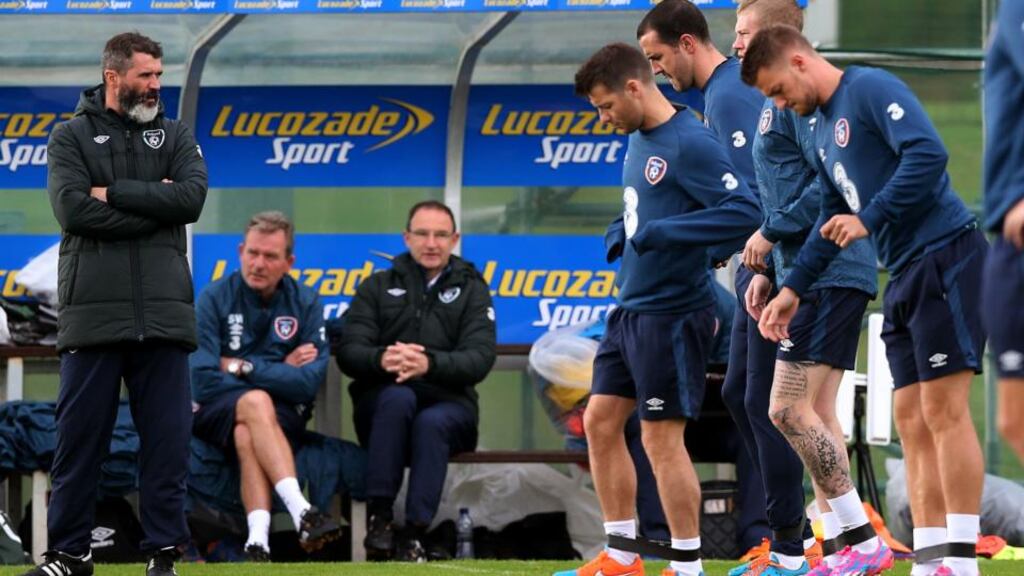 Republic of Ireland assistant manager Roy Keane (left) and manager Martin O’Neill (centre) look on during a squad training session at Gannon Park, Malahide. Photo: Brian Lawlwss/PA