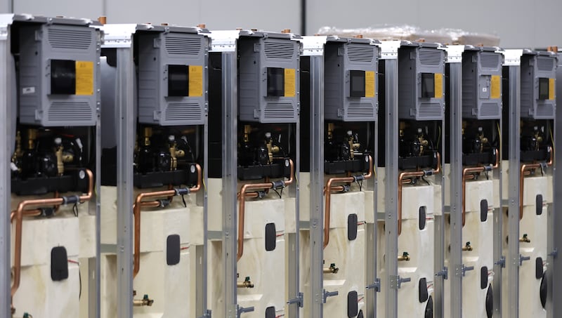 Components of heat pump systems are seen at the Bosch company's production line in Eibelshausen, Germany. Photograph: Ronald Wittek/EPA