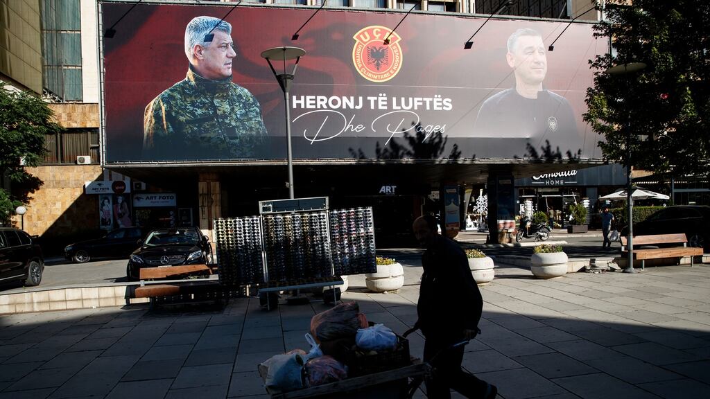 A banner in Pristina depicts Kosovan president Hashim Thaci and former speaker of the parliament Kadri Veseli – the inscription reads: “war heroes”. Photograph: Valdrin Xhemaj/EPA