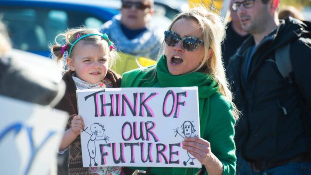 Chase supporter Charlotte Cargin and her daughter Eliza protest outside a Bord Pleanála application for the Indaver incinerator. Photograph: Michael Mac Sweeney/Provision