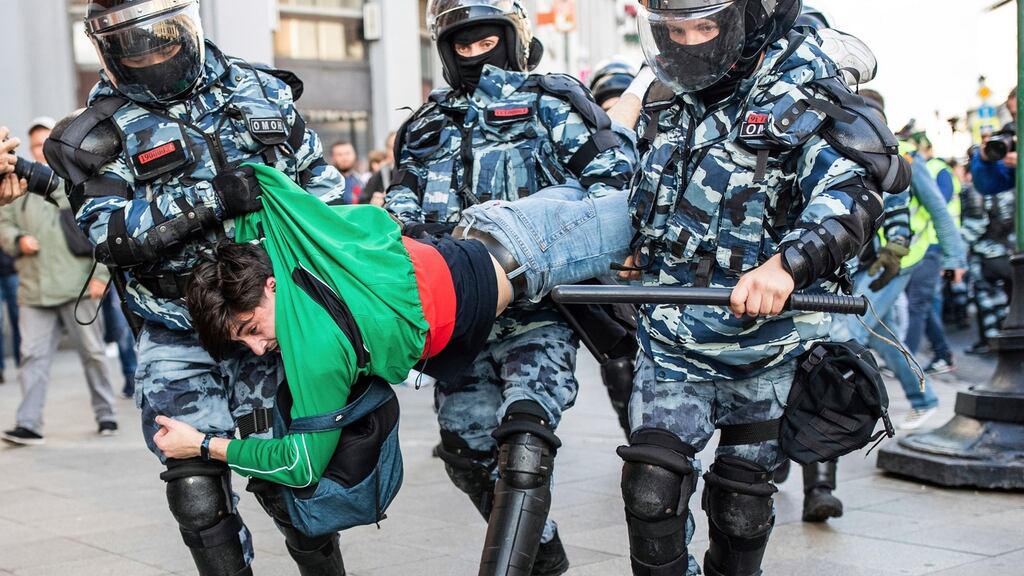 Police seize a man during a protest in Moscow against the exclusion of some city council candidates from an upcoming election. Photograph: Evgeny Feldman, Meduza via AP