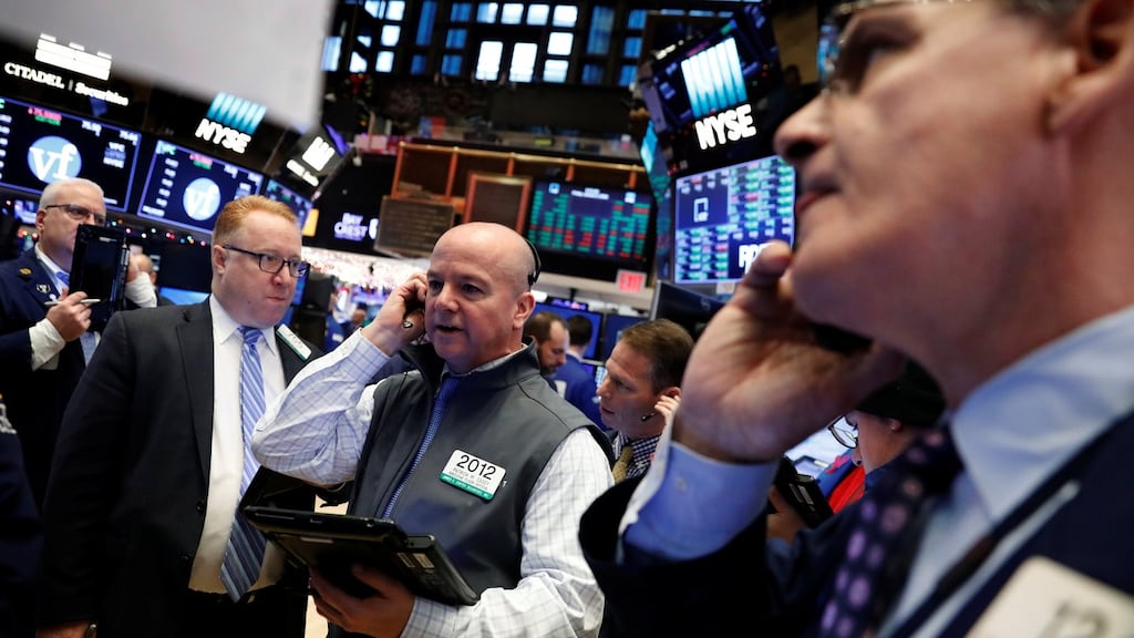 Traders on the floor of the New York Stock Exchange shortly after the opening bell on Friday. Photograph: Reuters/Lucas Jackson