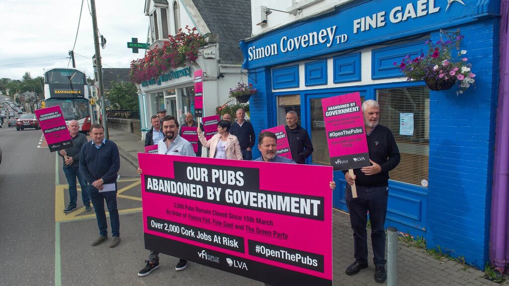 Cork publicans protest over pub closures outside Simon Coveney’s offices in Carrigaline, Co Cork. Photograph: Michael Mac Sweeney/Provision