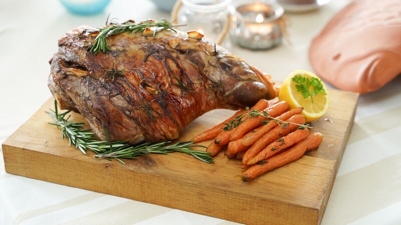 Leg of Lamb: Pierce the leg of lamb with a sharp knife and insert garlic and rosemary sprigs into each incision