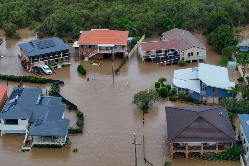 Floodwaters surround houses in Port Macquarie, north of Sydney. Photograp: Lindsay Moller/AAP Image via AP