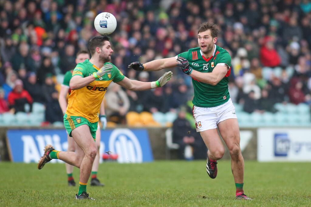 Mayo’s Aidan O'Shea and Donegal’s Brendan McCole in action during the Allianz Football League Division One game at MacCumhaill Park in Ballybofey. Photograph: Lorcan Doherty/Inpho
