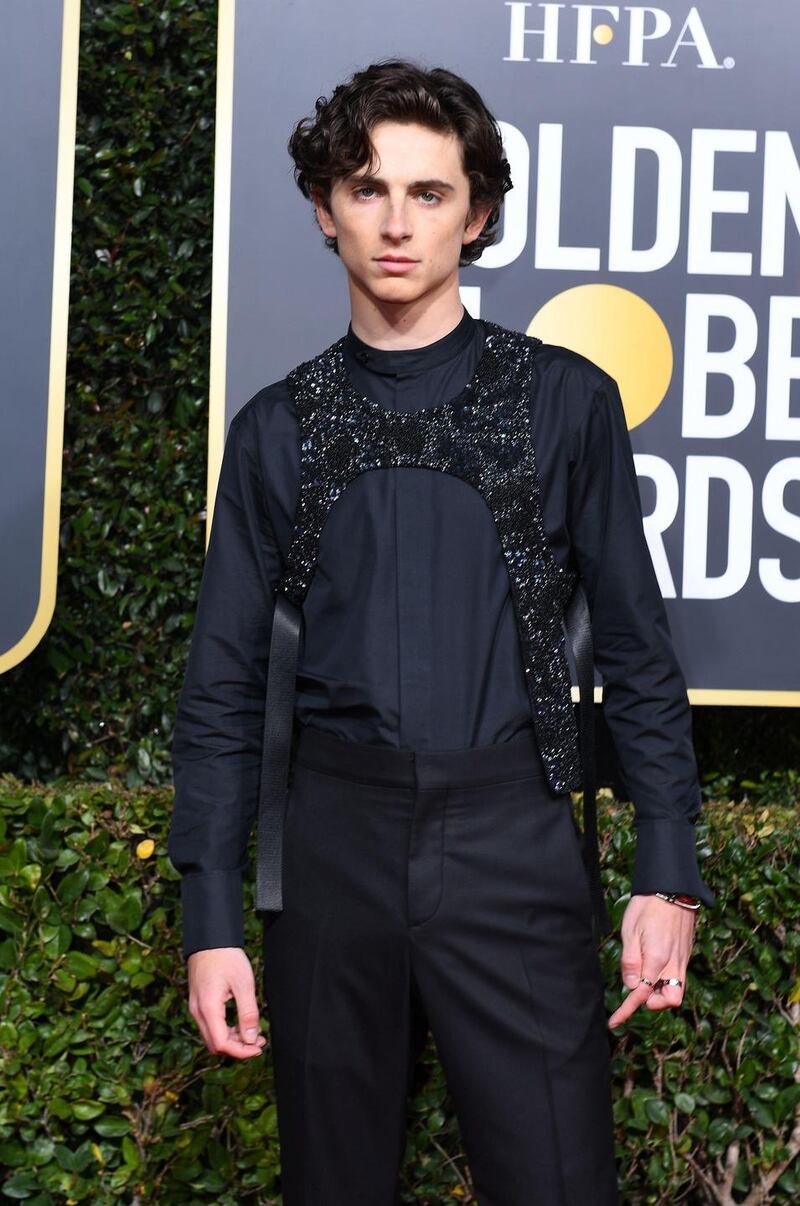 Timothée Chalamet in his much-talked-about ‘embroidered bib’ by Louis Vuitton. Photograph: Valerie Macon/AFP/Getty images