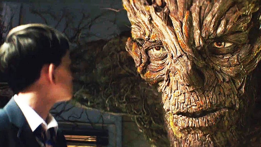Lewis MacDougall with the monster (voiced by Liam Neeson) in A Monster Calls