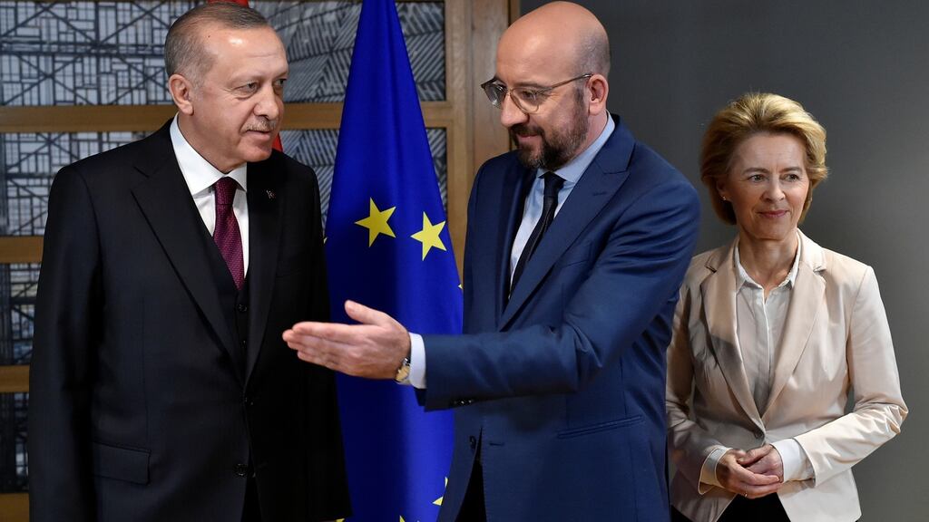 EU Council president Charles Michel (centre) and European Commission president Ursula von der Leyen (right) welcome Turkish president Tayyip Erdogan (left) before their meeting at the EU headquarters in Brussels, Belgium on Monday. Photograph: John Thys/Pool via Reuters