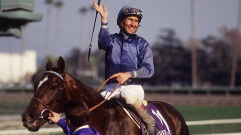 Jockey Jerry Bailey celebrates his 133-1 victory on Arcangues. Photograph: JD Cuban/Getty/Allsport