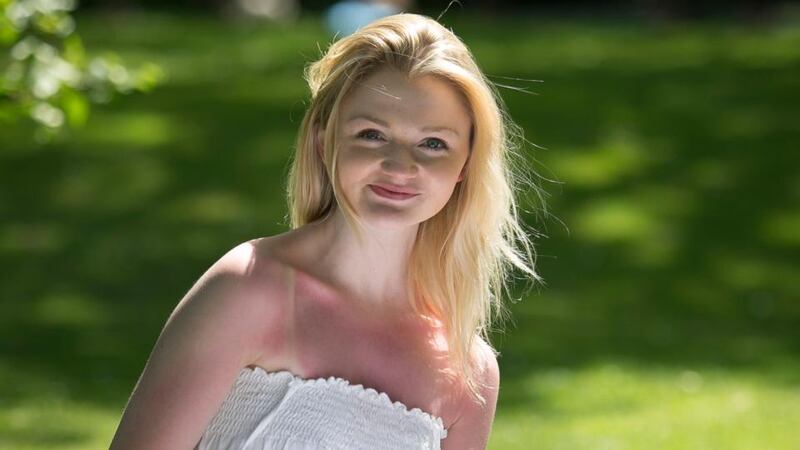 Leaving Cert student Becca Furlong enjoying the sunshine in St Stephen’s Green, Dublin, yesterday following exams. Photograph: Gareth Chaney/Collins