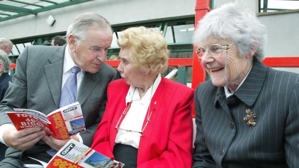 Former taoiseach Albert Reynolds picks up a few tips from Margaret Murphy and Mary Tuite, both of Ardcath, Co Meath, at the opening day of the 2005 Galway Races. Photograph: Joe O’Shaughnessy.