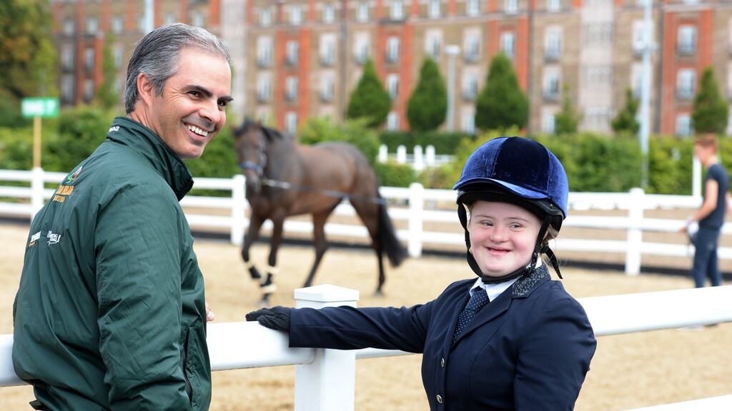 Aga Khan manager Rodrigo Pessoa, with Gemma Haire, Inistioge, Kilkenny, supporting the Riding for the Disabled Association Ireland, ahead of the Dublin Horse Show. Photograph: Dara Mac Dónaill