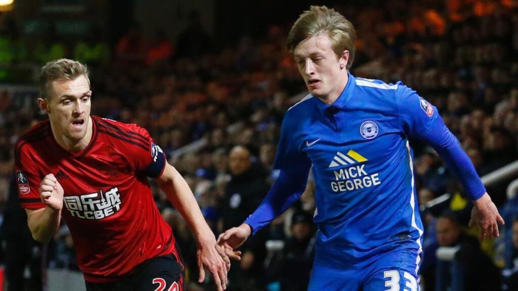 West Bromwich Albion’s Darren Fletcher vies with Peterborough United’s Irish midfielder Chris Forrester during the English FA Cup fourth round replay. Photograph: Lindsay Parnaby/AFP/Getty Images