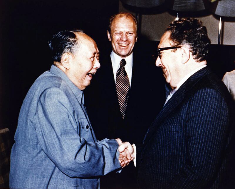 US president Gerald Ford watches as secretary of state Henry Kissinger shakes hands with the Mao Tse-tung, chairman of the Chinese Communist Party, in 1975. Photograph: Photo 12/Universal Images Group via Getty Images