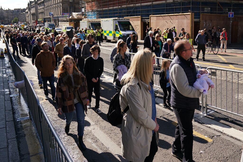 Members of the public queueing to pay their respects to the Queen on Tuesday as she lies at rest at St Giles' Cathedral, Edinburgh. Photograph: Jacob King/PA Wire