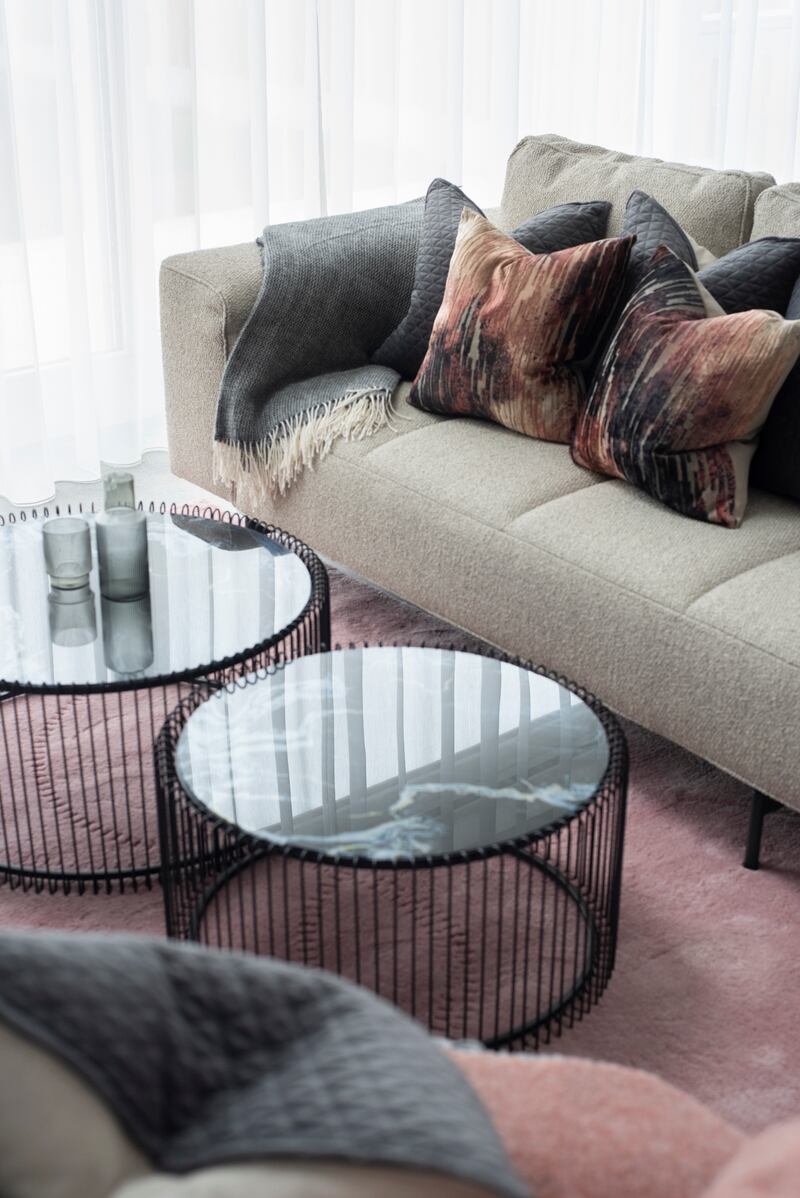 Clear surfaces such as coffee and side tables so there is space to leave drinks or nibbles. Photograph: Anne Wickham