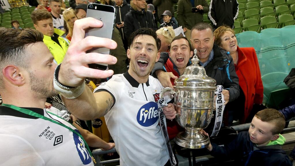 Dundalk’s Richie Towell celebrates with the FAI Cup. Photo: Ryan Byrne/Inpho