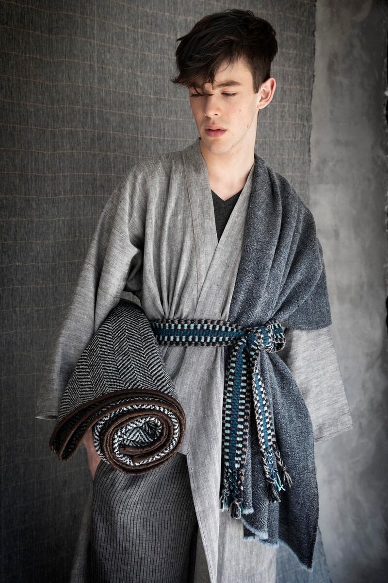 Irish linen kimono (€395), lrish linen pinstripe drawstring trousers from (€260) worn with linen/wool scarf from €150 and crios belt from (€75), handwoven herringbone leather trimmed blanket from (€350). Photograph: Barry McCall