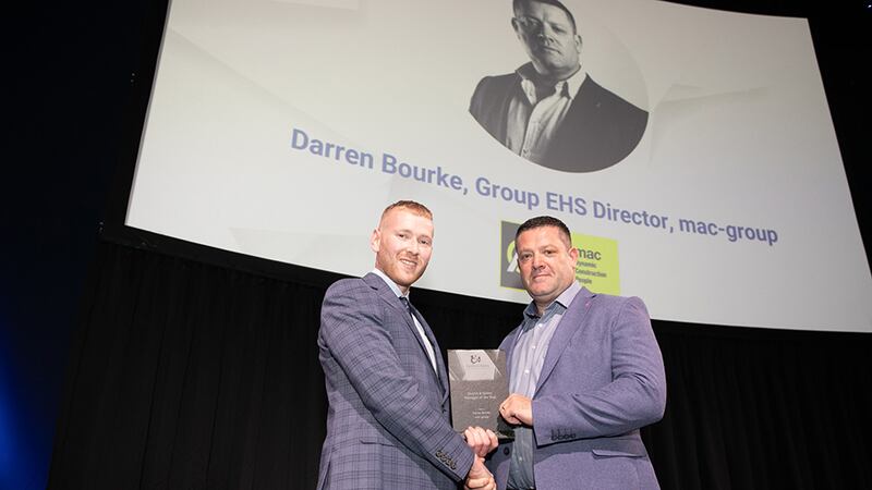 Neil Wall, Head of Entries at BusinessRiver, presents the Health & Safety Manager of the Year to Darren Bourke, mac-group.