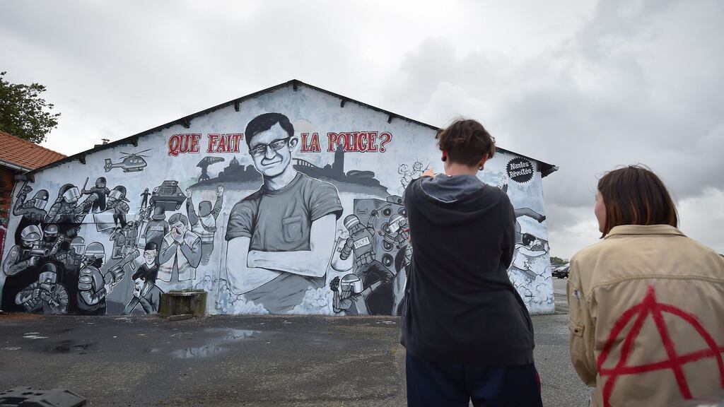 A mural depicting Steve Maia Caniço, who went missing after a police raid on a music festival in Nantes last month, and whose body was found in the Loire river on Monday. Photograph: Loic Venance/AFP/Getty Images