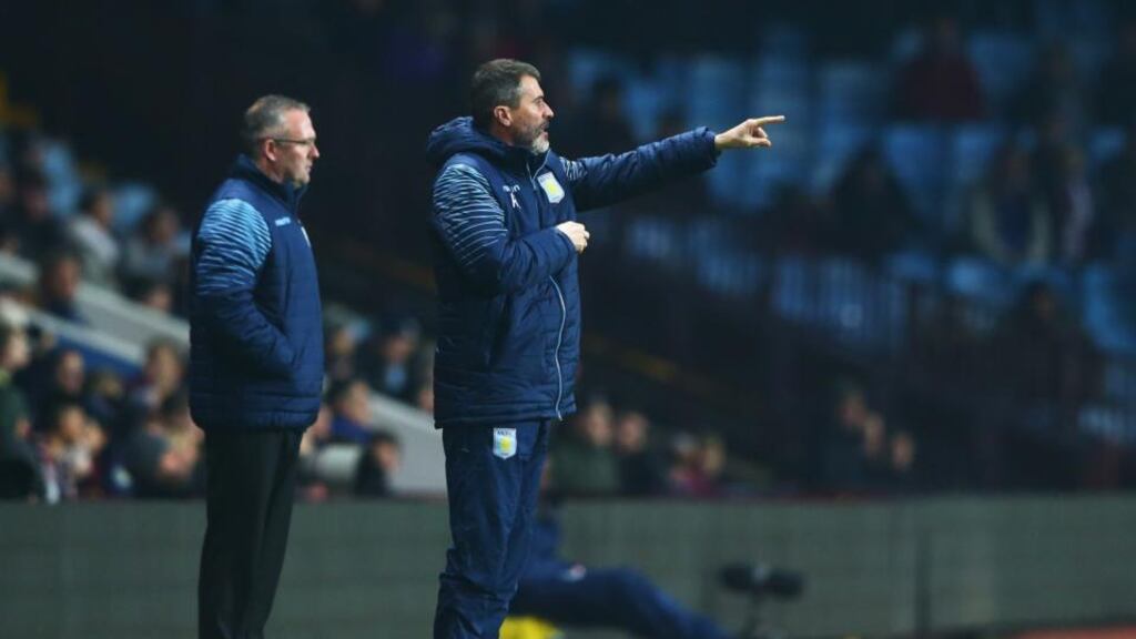 Aston Villa manager Paul Lambert and assistant Roy Keane look on from the touchline during the match at Villa Park. Photograph: Matthew Lewis/Getty Images