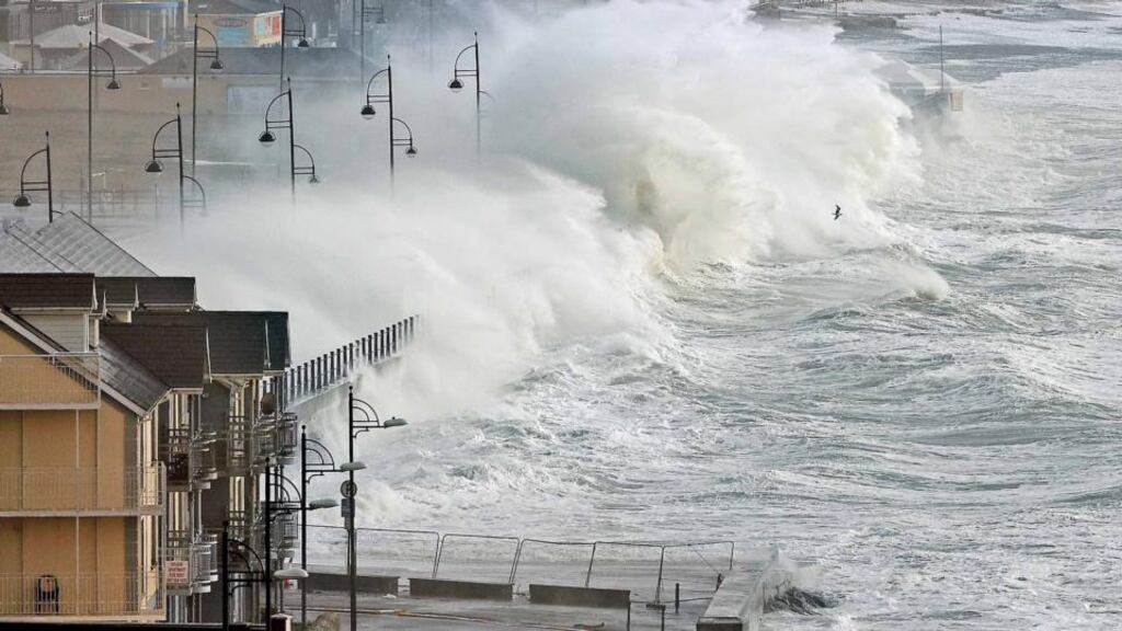 Waves hitting Tramore, Co Waterford, during the Christmas storms. The initial estimate of storm damage to public amenities in Clare, Galway, Waterford, Mayo and Kerry stands at €65 million. Damage to private property has been estimated at up to €250 million. Photograph: Noel Browne