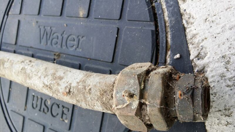 Lead piping excavated from the driveway of a home in Sandymount, Dublin, beside a water meter fitted by Irish Water. File photograph: Frank Miller