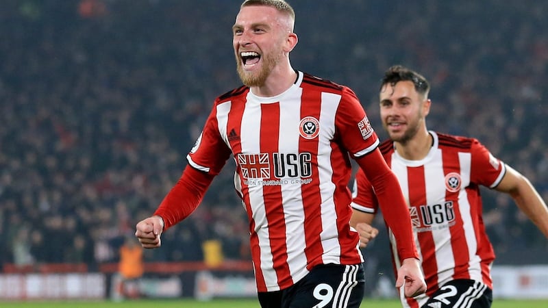 Sheffield United’s Oliver McBurnie celebrates after scoring his side’s third goal. Photograph: Jon Super/AP Photo