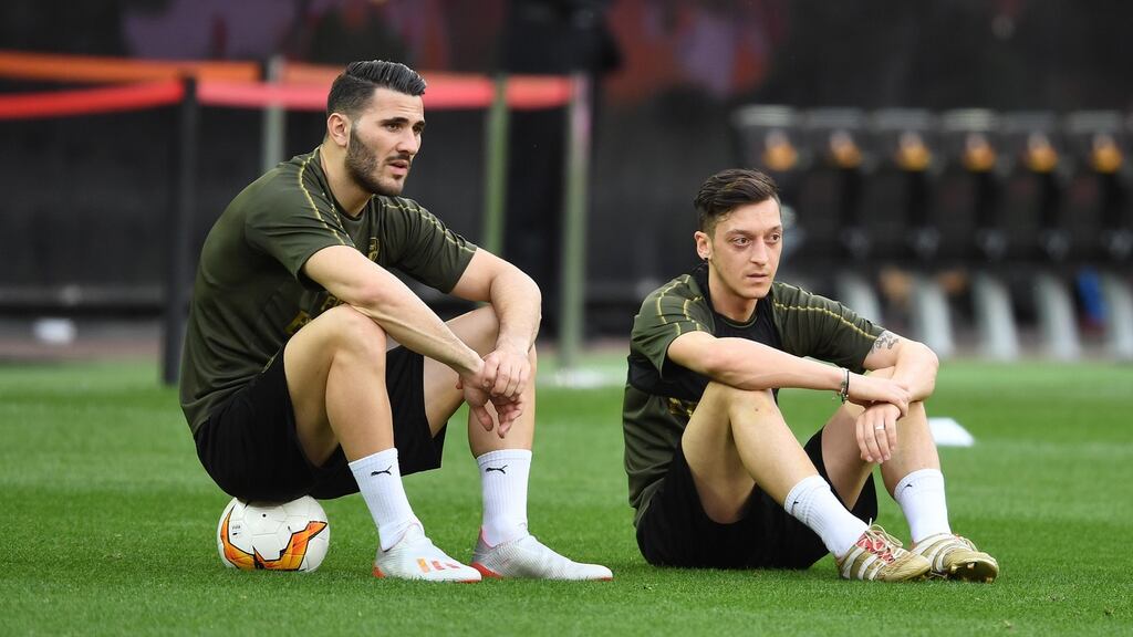 Arsenal’s Sead Kolasinac (left) and Mesut Ozil. Photograph: Stuart McFarlane/Getty Images